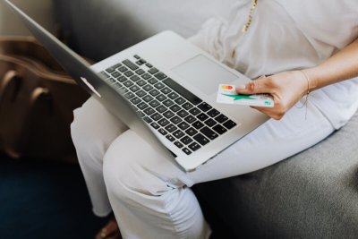 woman using her card on a website
