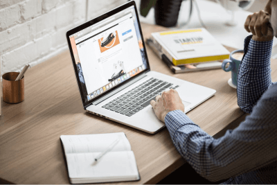 male sitting at laptop