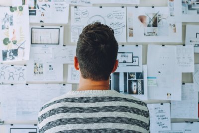 a man looking at his content plan and design