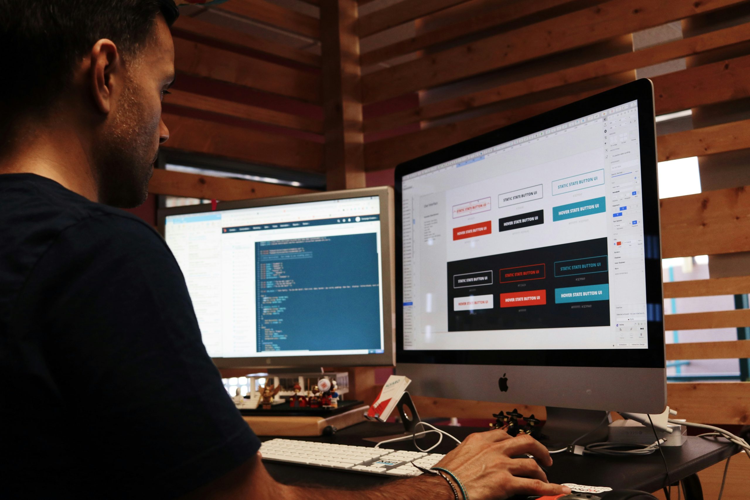 man working on a website at his desk