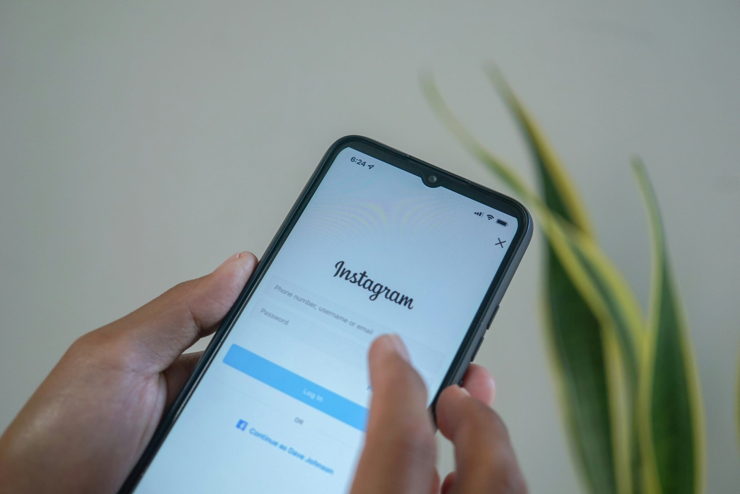 a phone with the instagram log in page