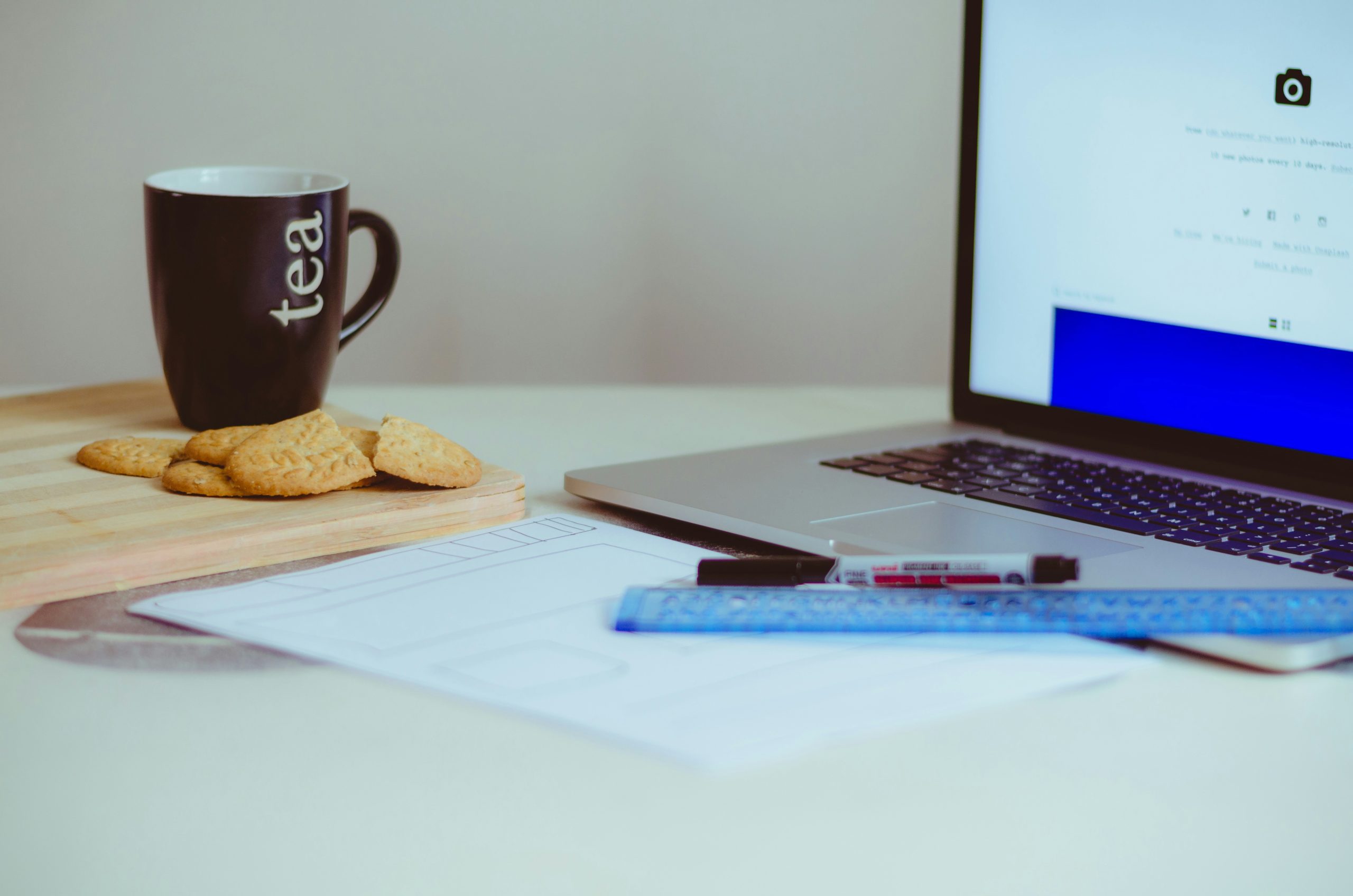 laptop, tea and cookies